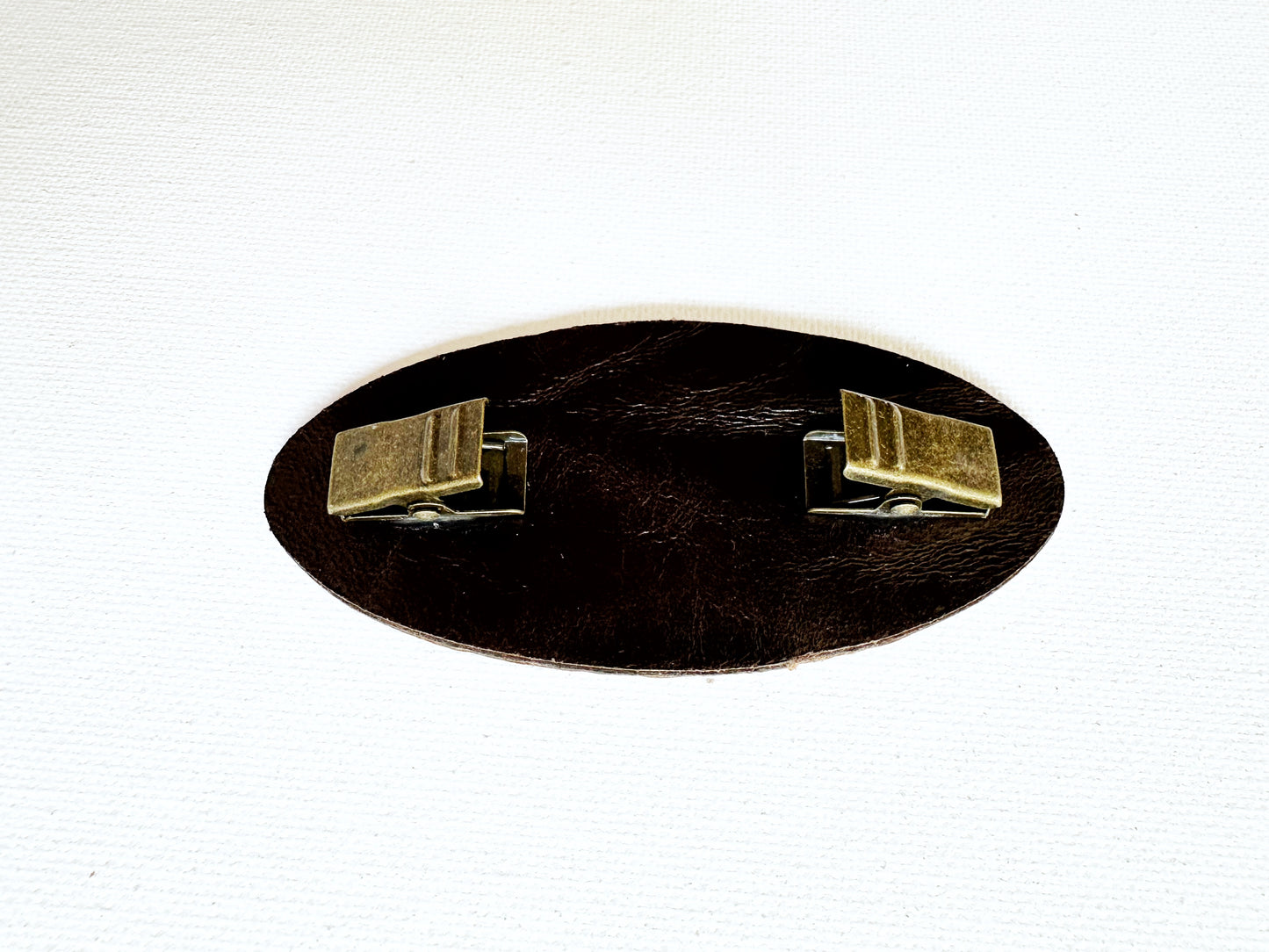 "Impressions" Raised Embossed Brown Leather Clasp