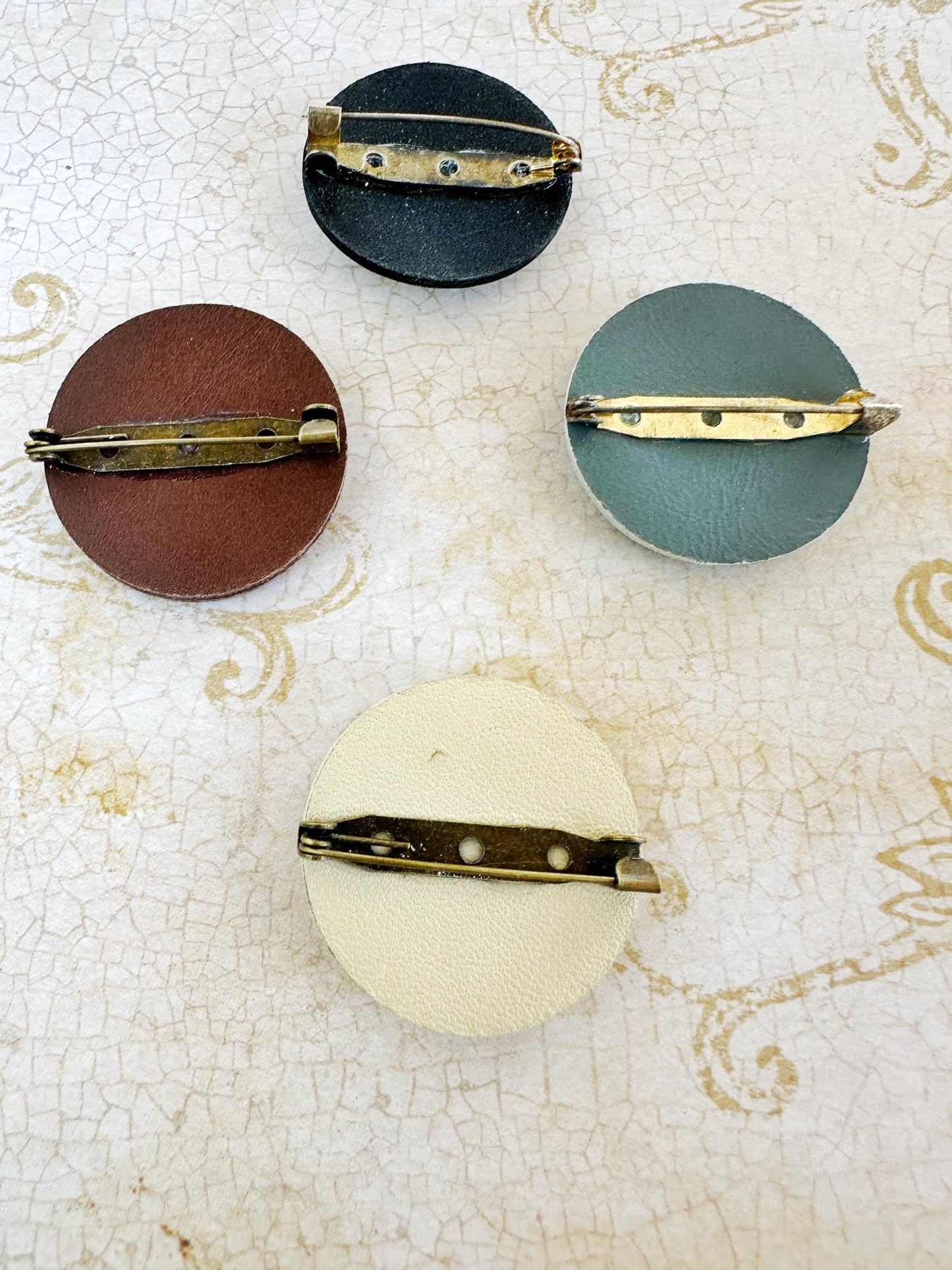 Single Metal & Leather Medallion Brooch Pin